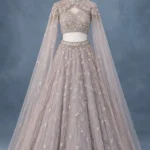 Dusty Lavender Grey Sequined Net Designer Lehenga Set with High-Neck Cape Sleeves